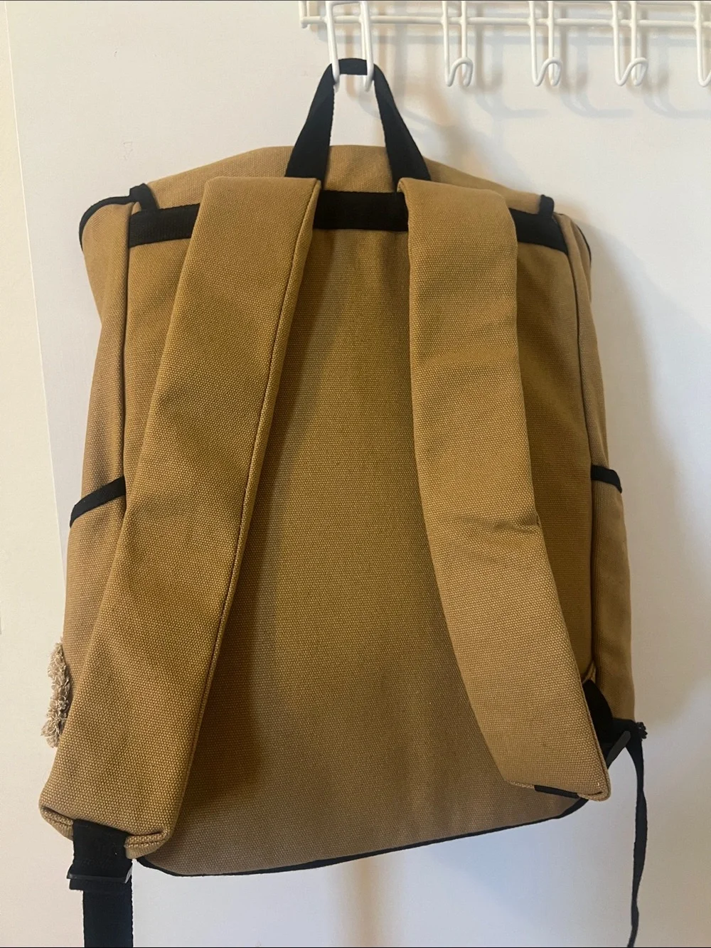 Tan Canvas Backpack with Black Trim